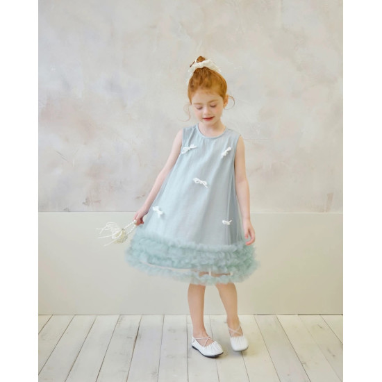 فستان بناتي تركوازي مزين بالفيونكات 